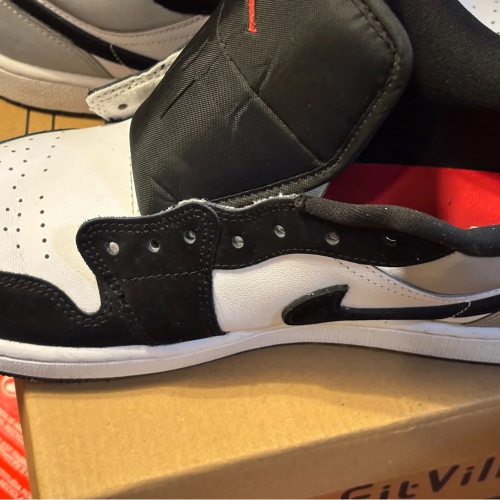 Jordan Black and White Athletic Shoes with Red Accent